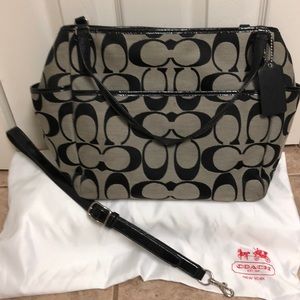 Black and gray Coach diaper bag